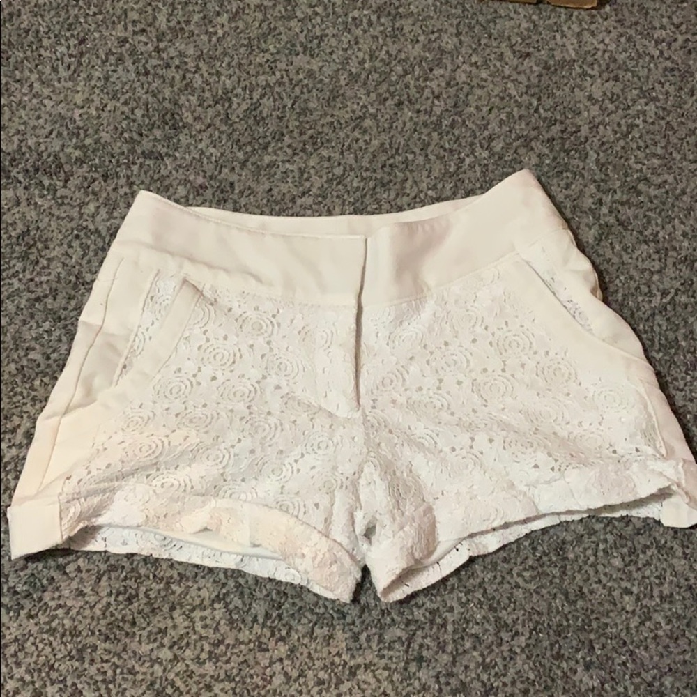 Maurice’s white shorts